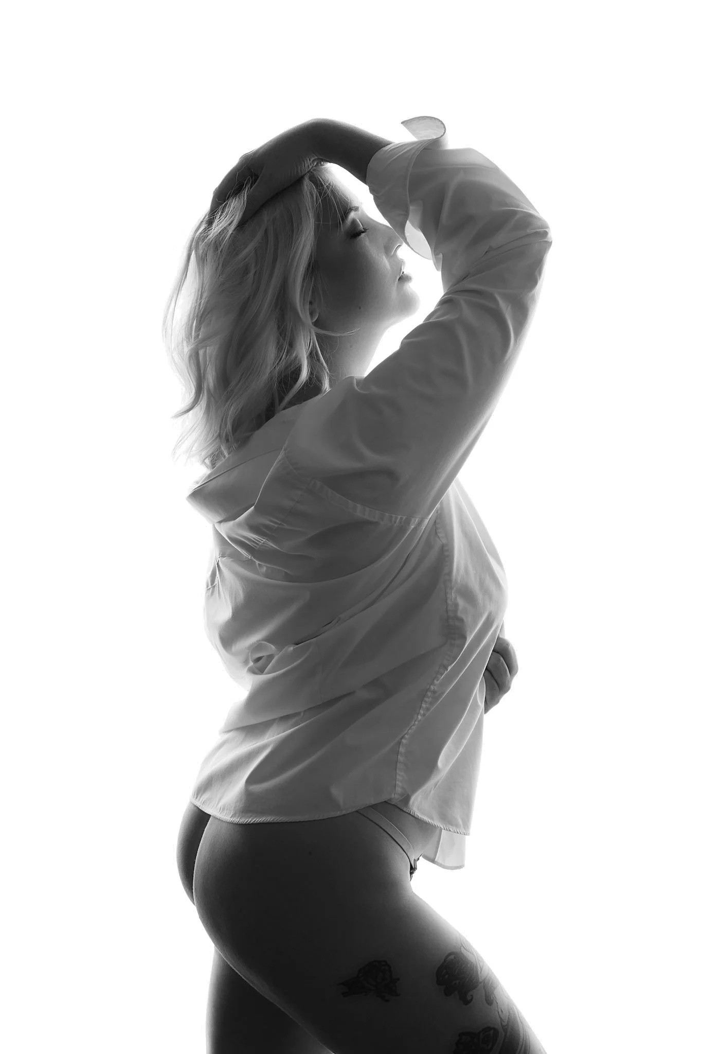 "Elegant semi silhouette highlighting feminine shape & strength"