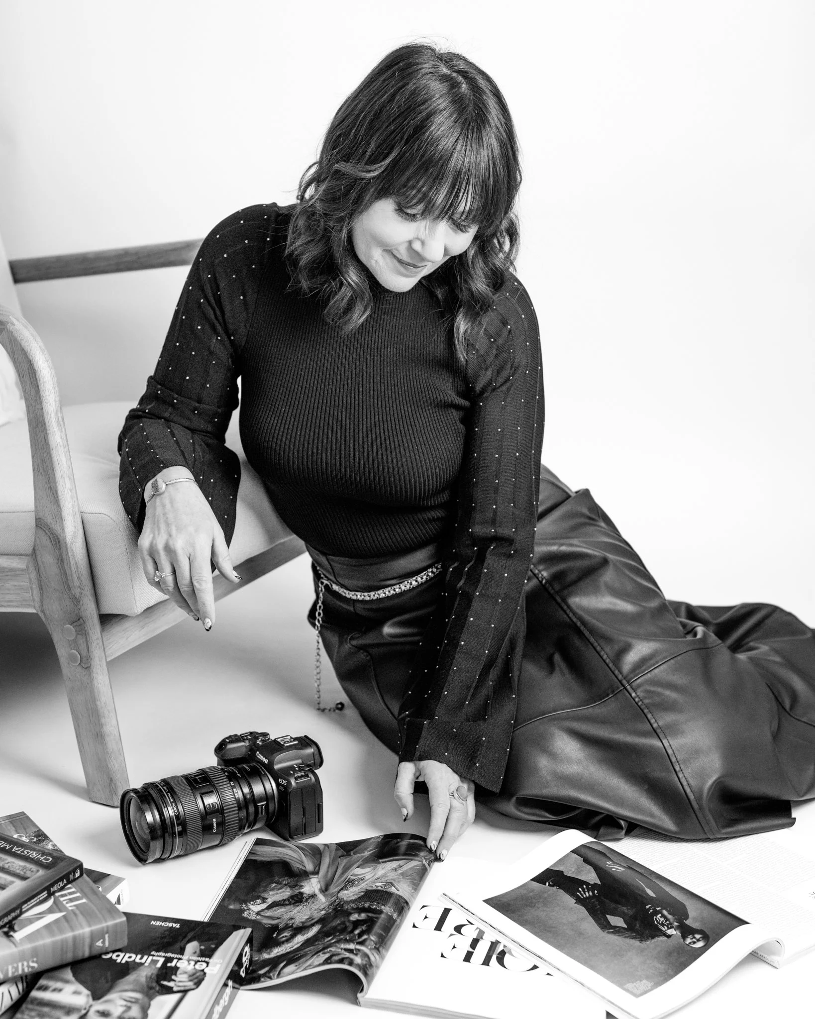 Boudoir photographer with camera in her shrewsbury studio
