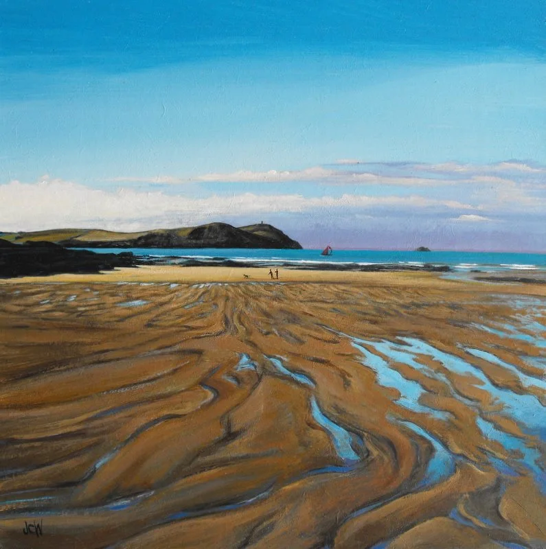 A painting of a beach with sand, water, and distant hills under a blue sky with clouds. Two people are walking near the shoreline, and a boat is sailing in the water.