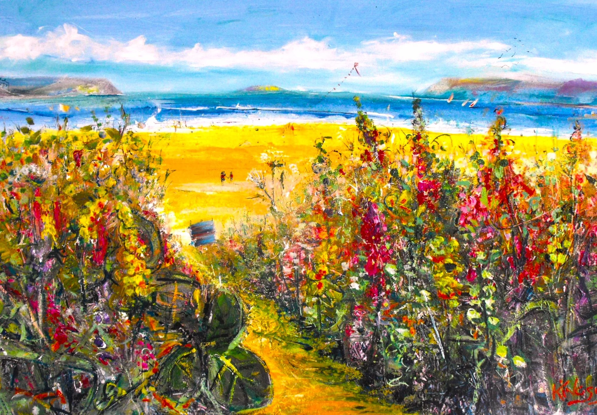 Bright seaside landscape with colorful flowers in the foreground, a sandy path leading to the beach, and a blue ocean with boats and distant hills under a partly cloudy sky.