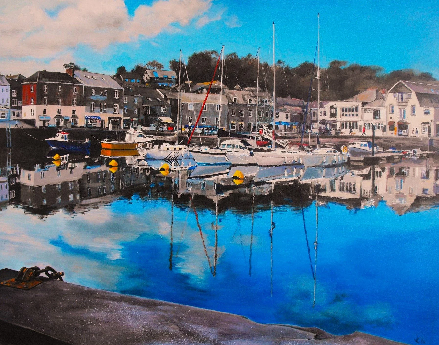A painting of a harbor with sailboats docked, colorful buildings along the waterfront, and their reflections in the calm water under a partly cloudy sky.