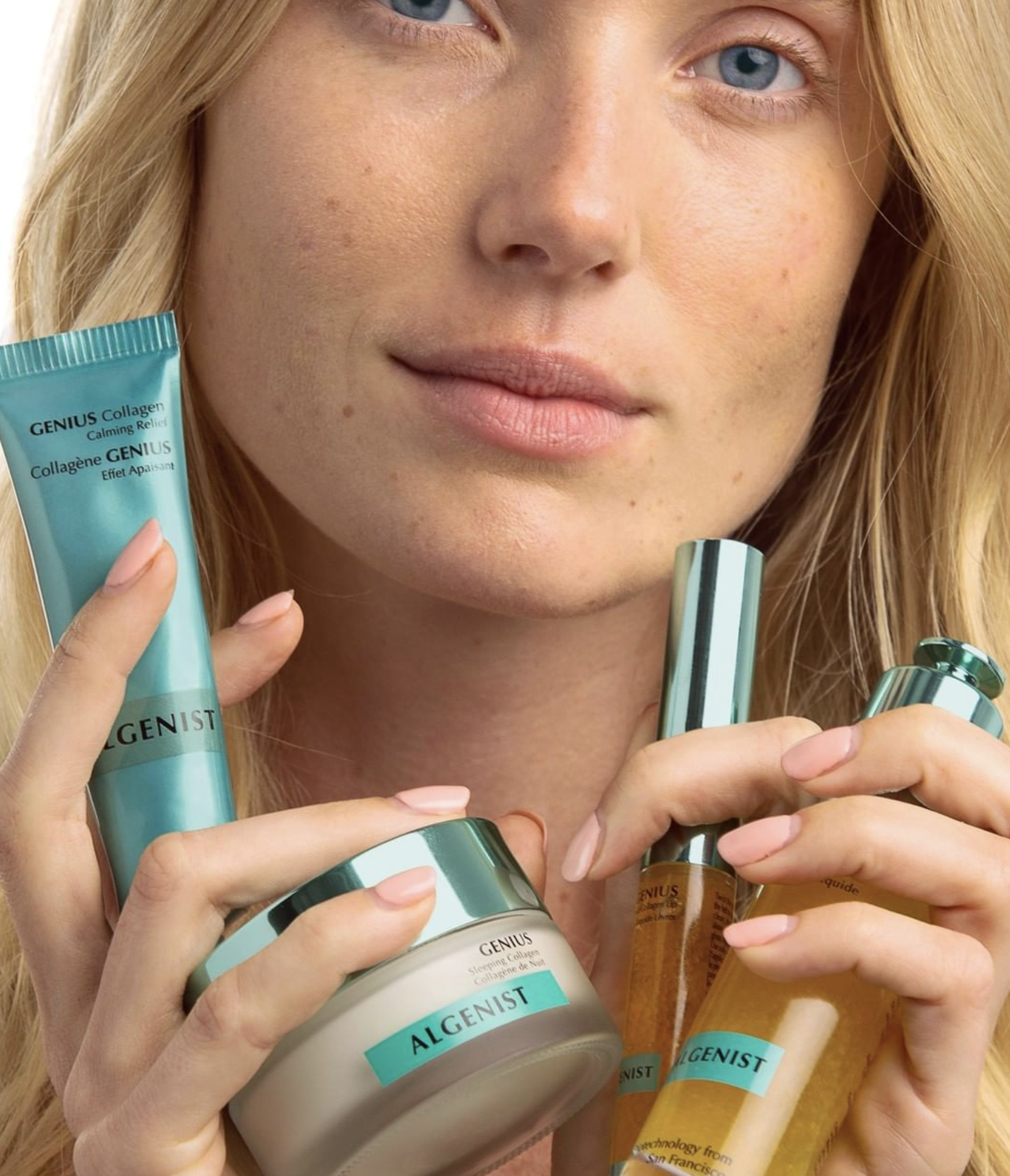 Algenist Skincare Products shot with model holding products.