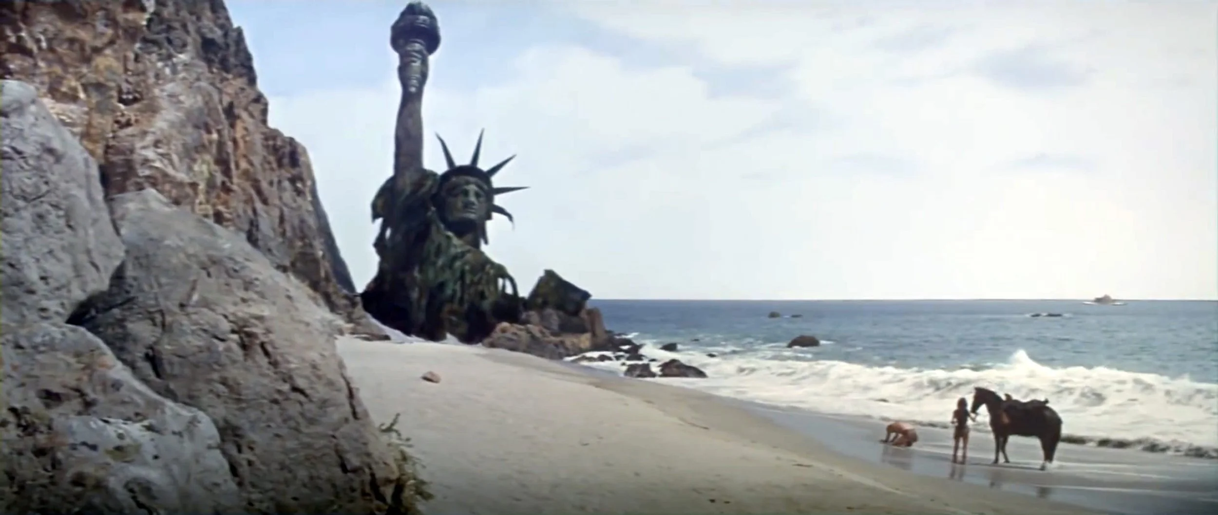 The ruins of The Statue of Liberty on a beach in Planet of the Apes