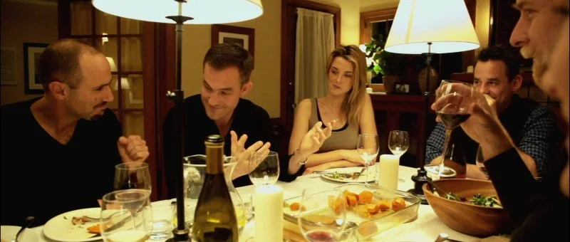 Dinner party scene from Coherence