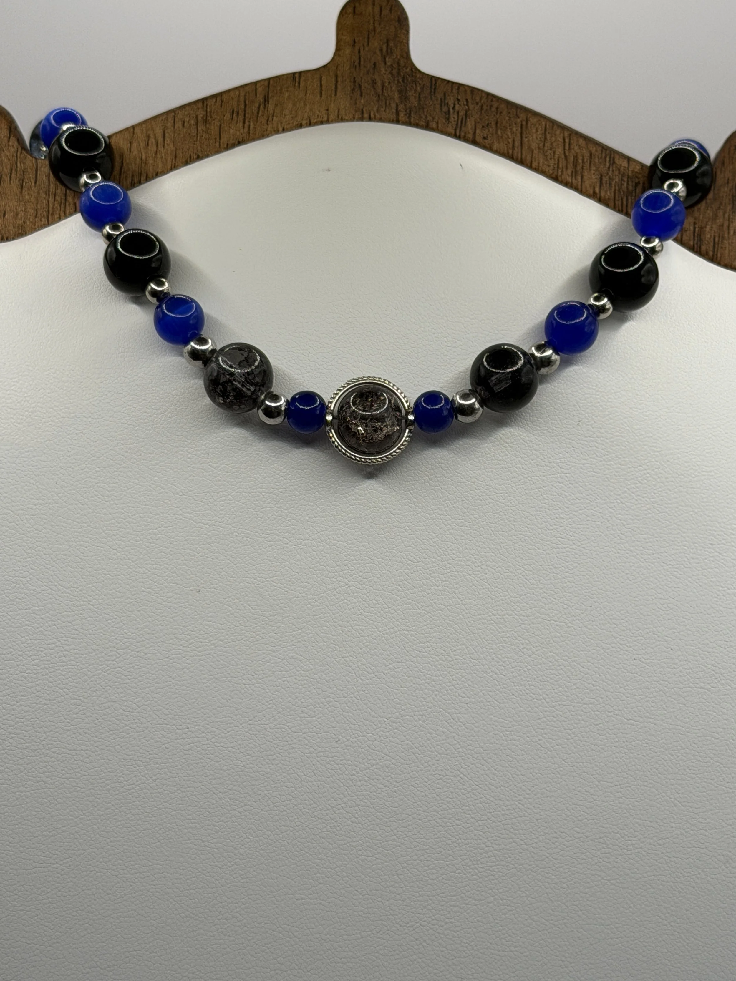 Nyx Melainis_Charm.jpg