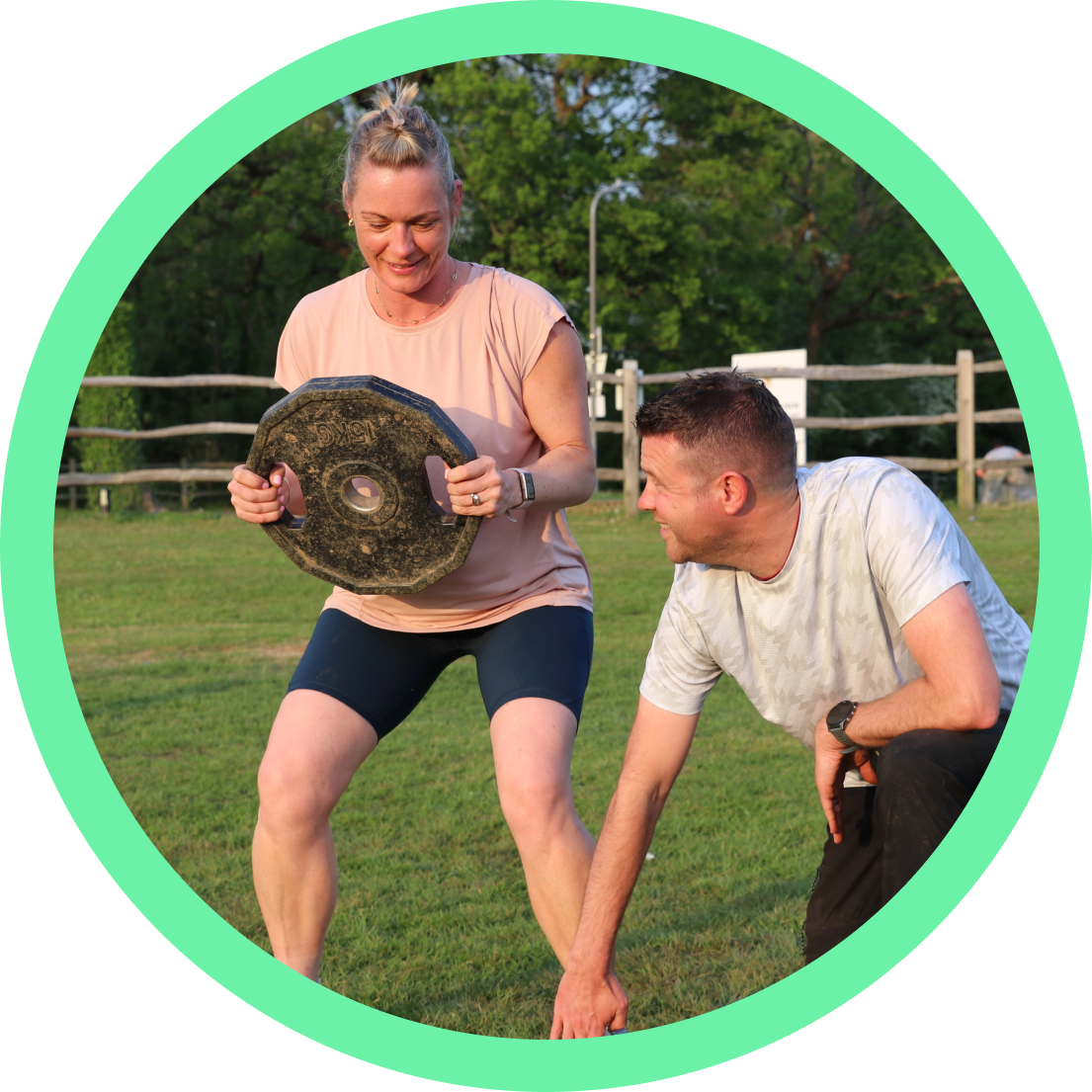 Personal trainer with client.