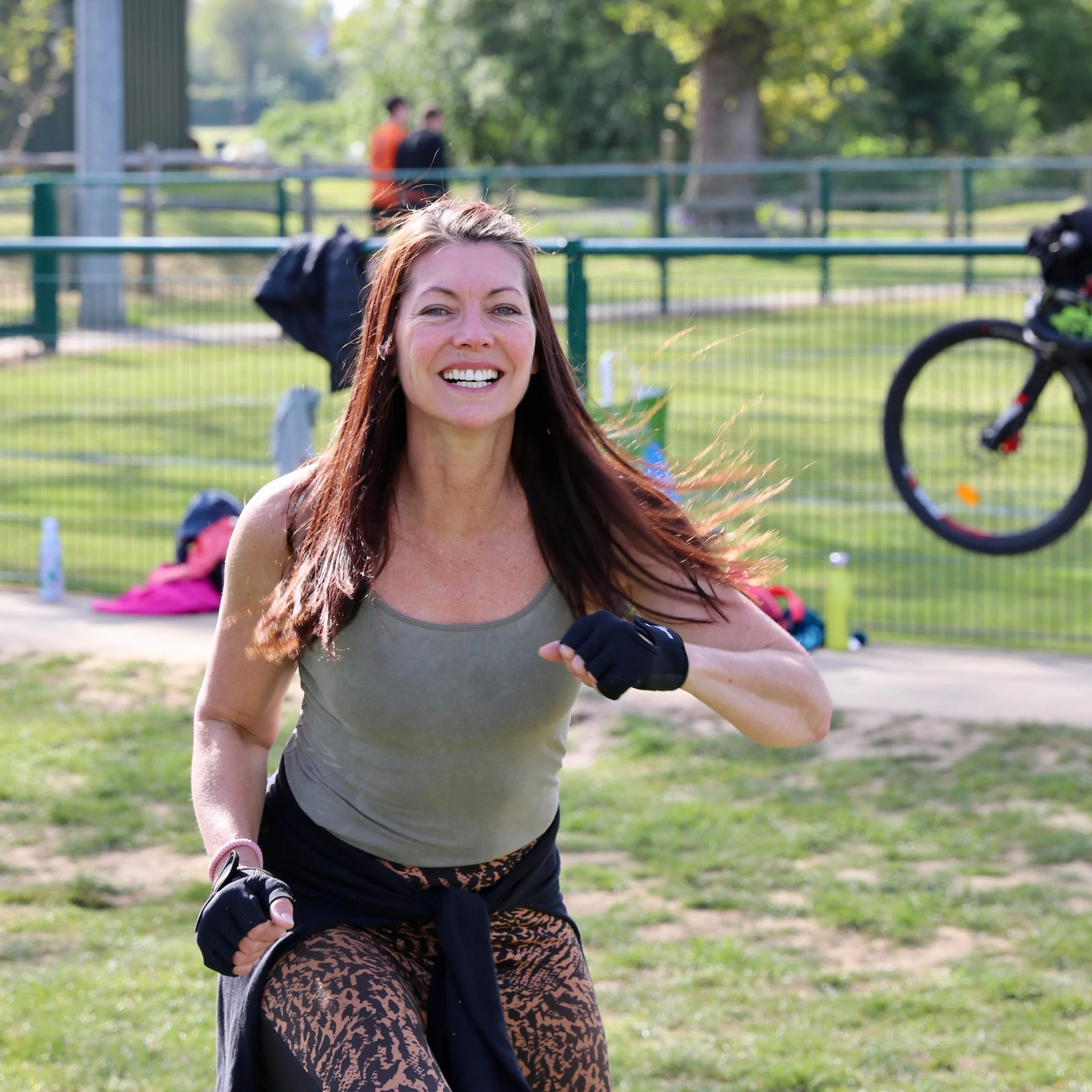 Happy female exercise group member.
