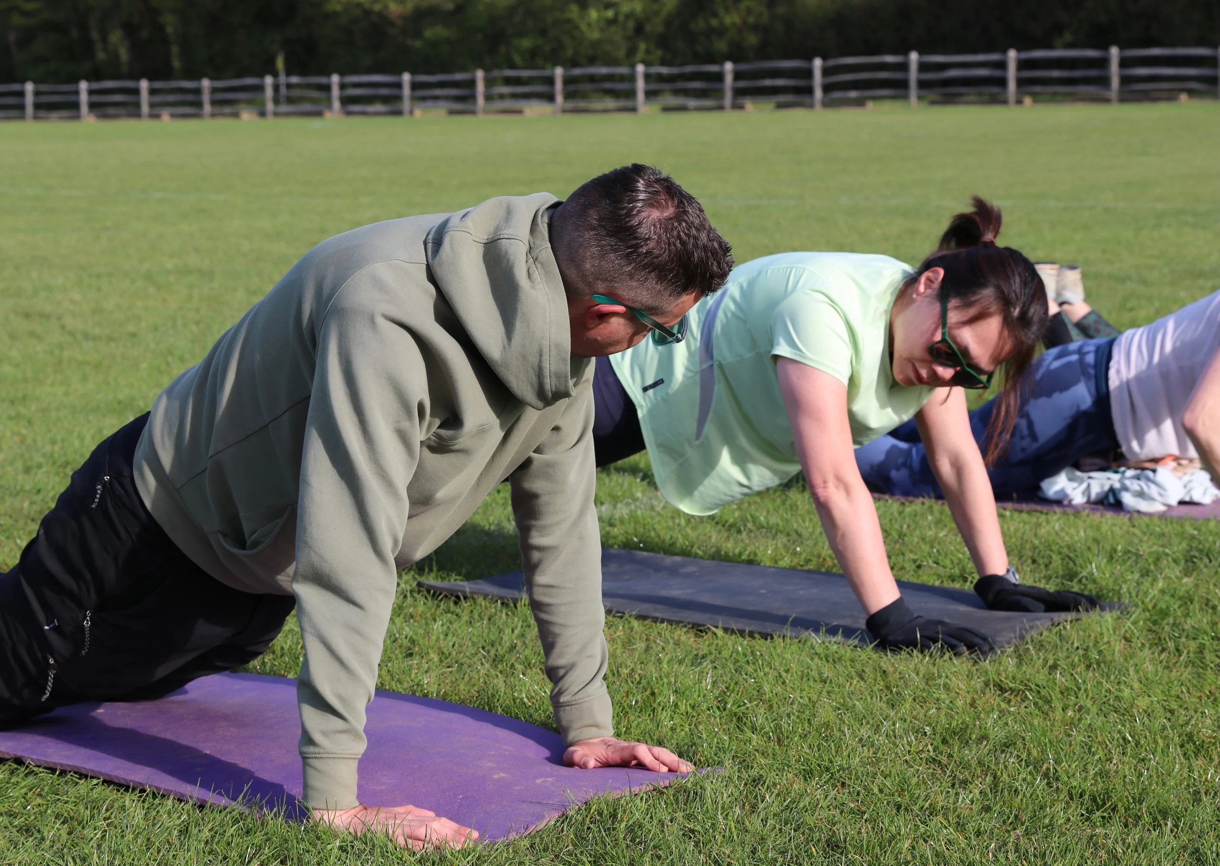 Man lifting a heavy exercise ball.