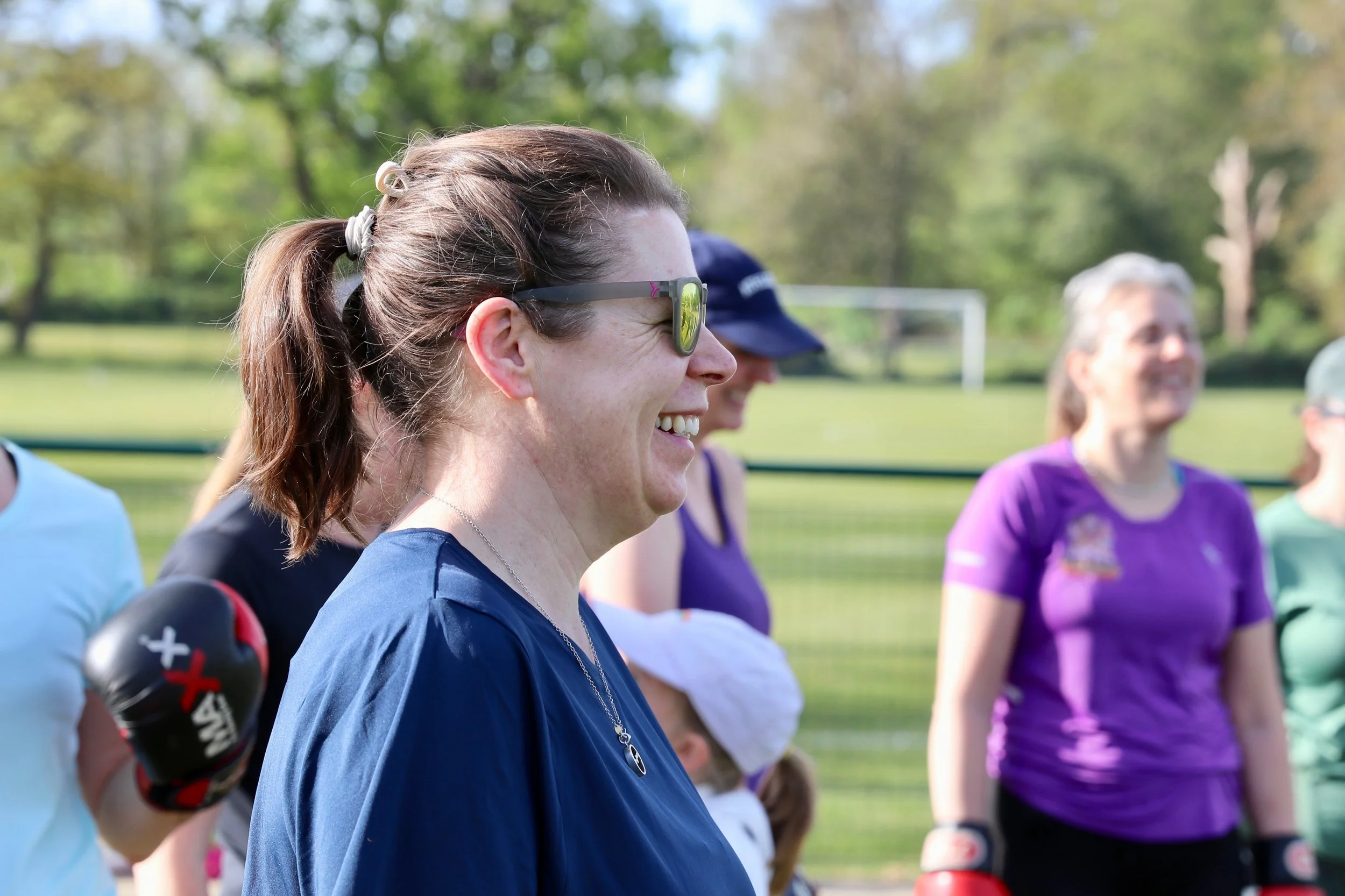 Happy female exercise attendee