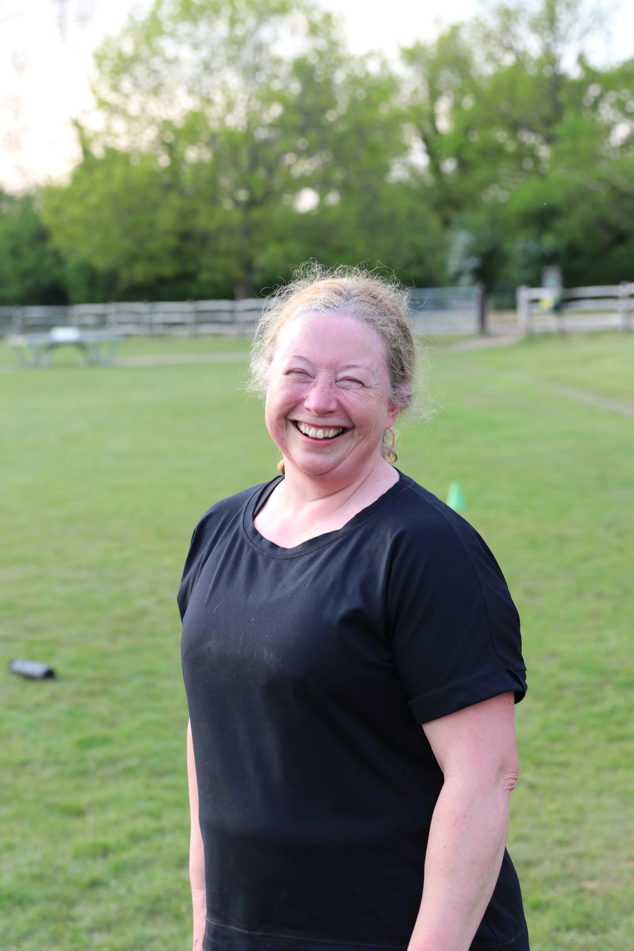Happy lady at a group exercise session.