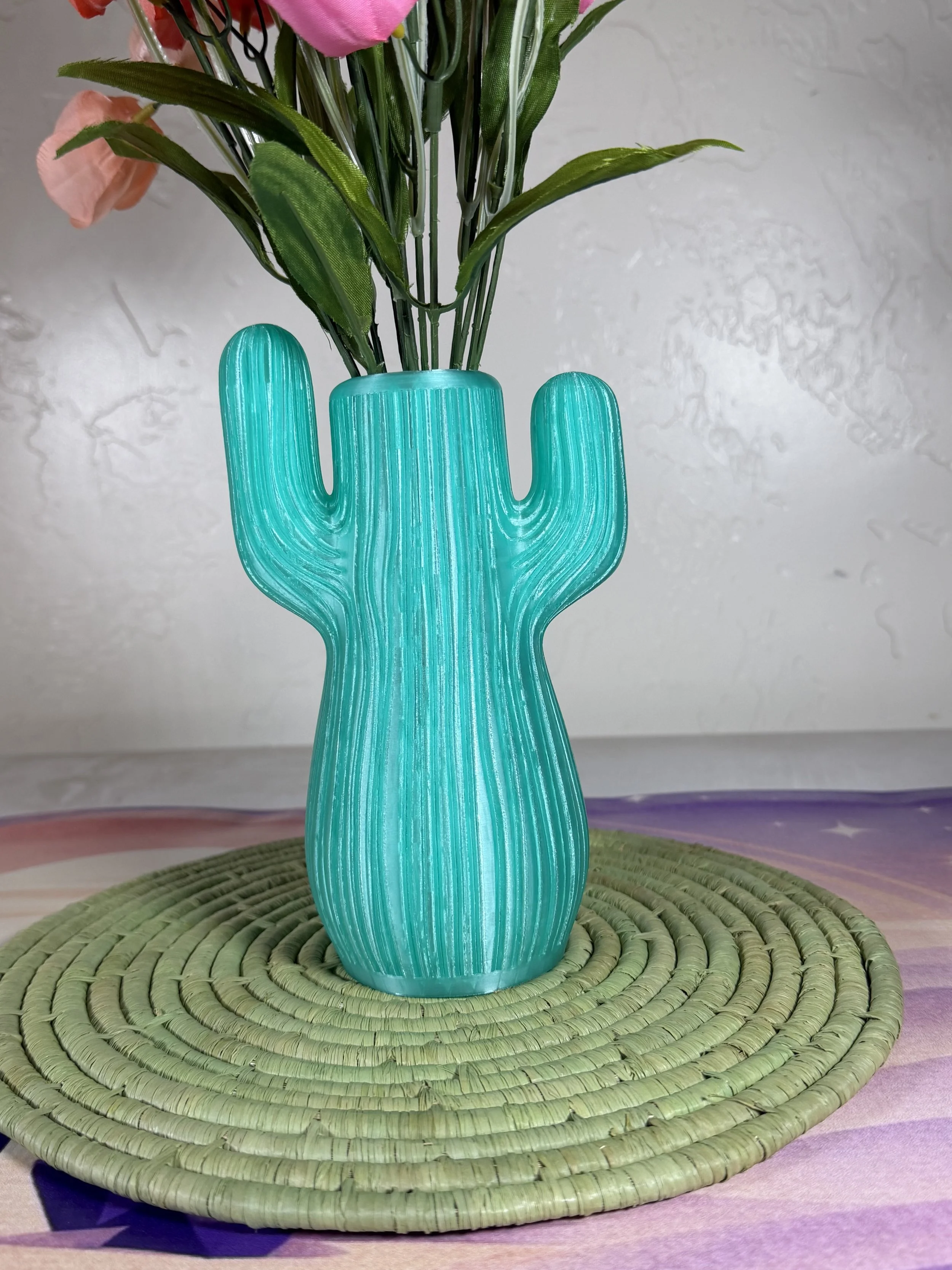saguaro-cactus-vase-translucent-teal-with-flowers.jpg