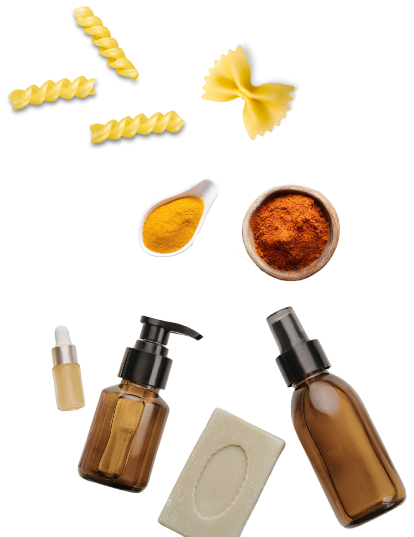 Beauty product bottles alongside uncooked pasta and bowls of seasonings.