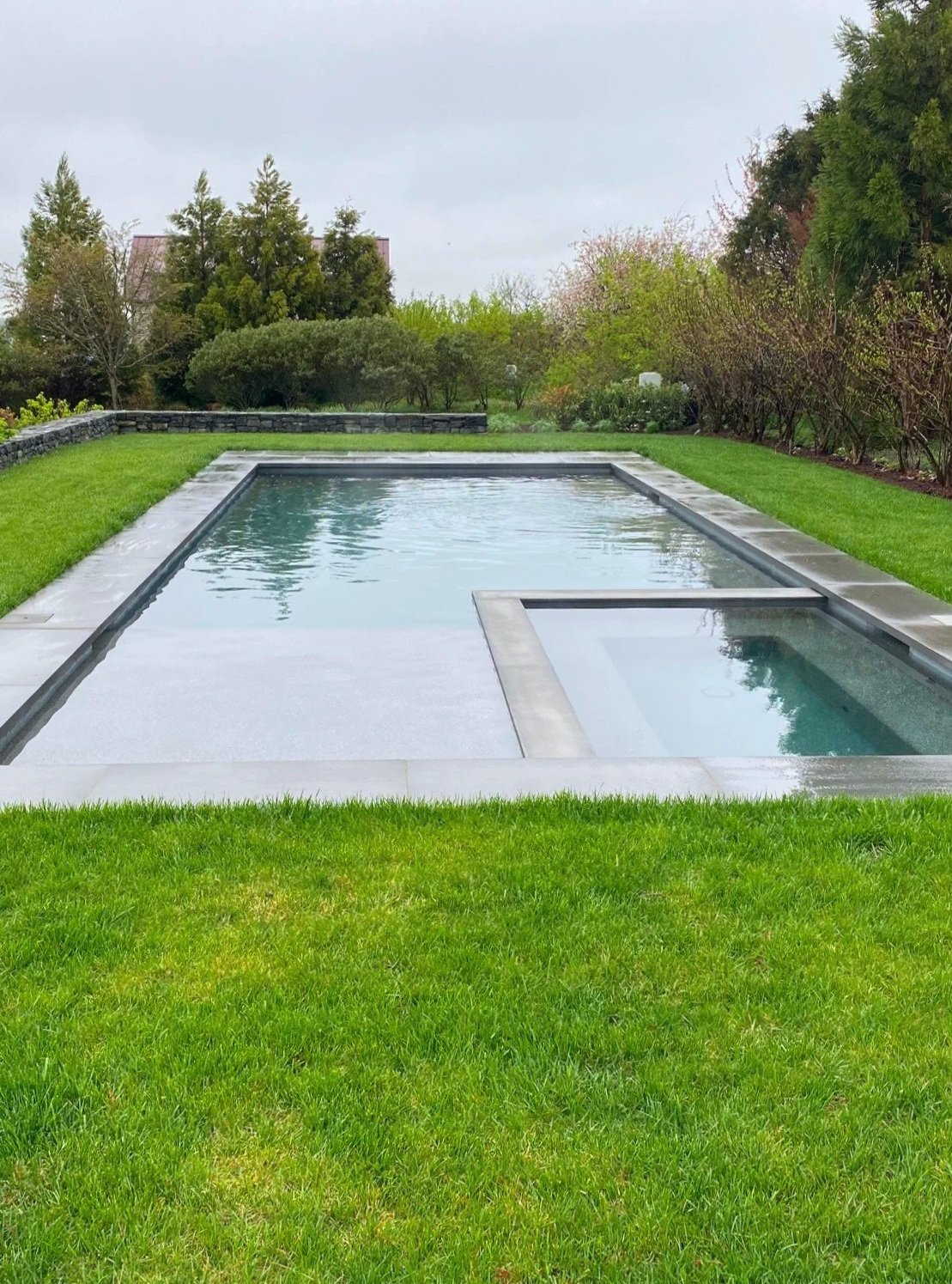 Retaining wall and inground pool in Charlestown, RI