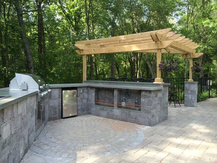 How Retaining Walls Support Long-Lasting Outdoor Kitchen Foundations in East Greenwich, RI