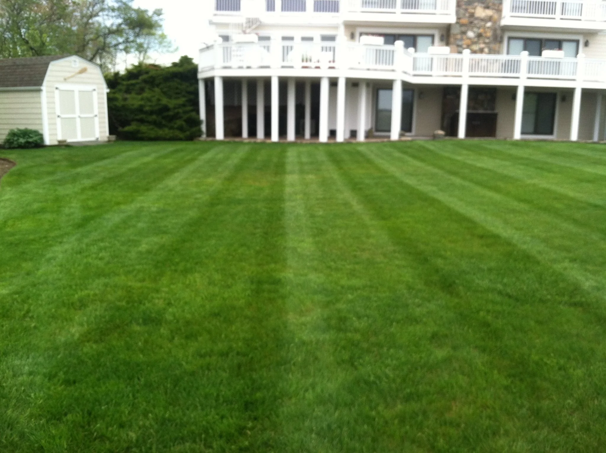 10 Ways Expert Lawn Mowing Elevates Your Outdoor Celebrations in Narragansett and East Greenwich, RI
