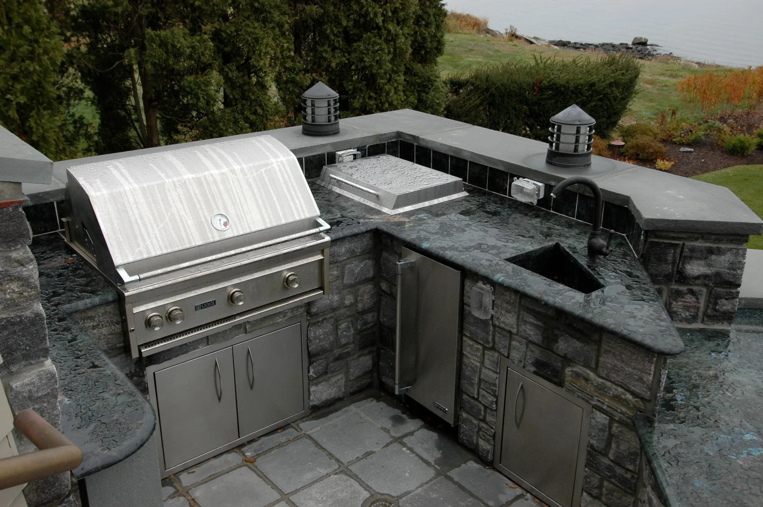 GrandScapes Outdoor Kitchen Steel Grill and Outdoor Lighting