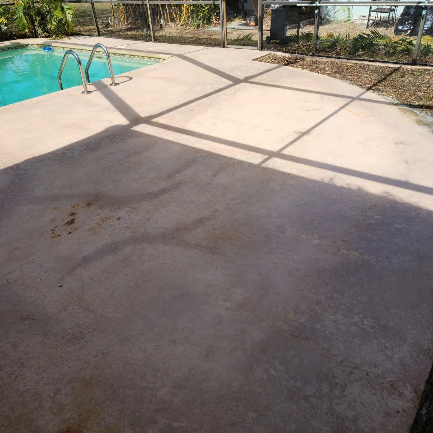 seminole painted pool deck pressure washing before Jungle Nation