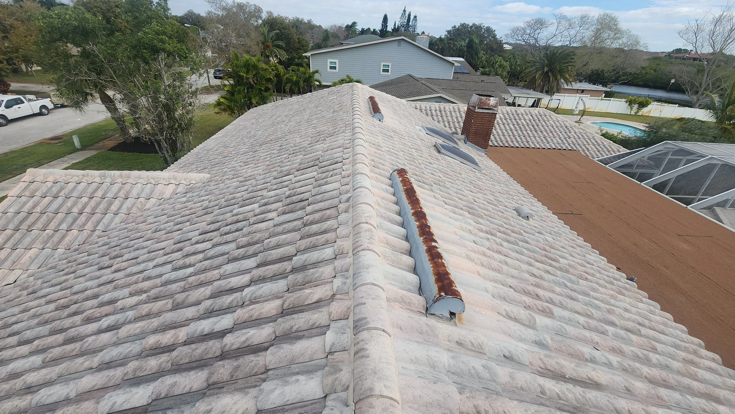 largo roof soft wash before Jungle Nation
