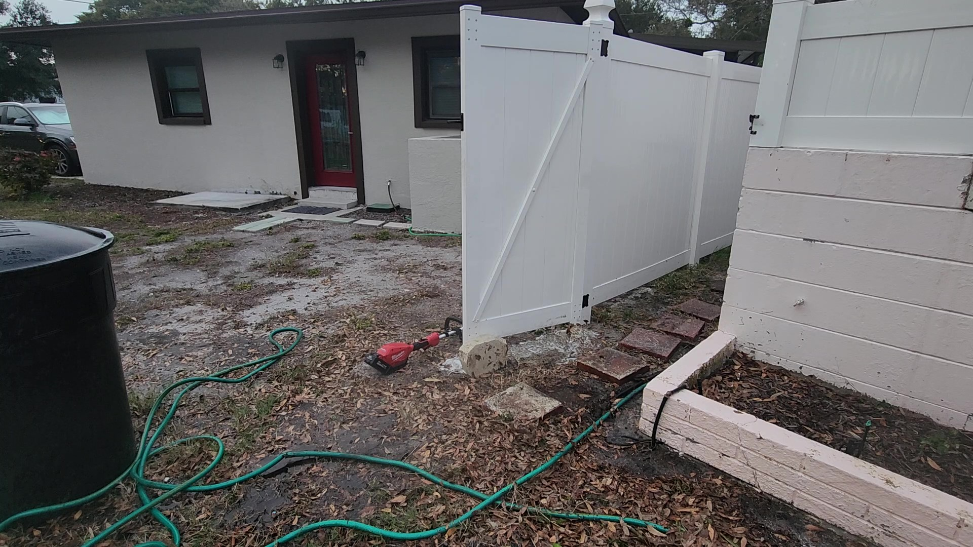 kenneth city vinyl fence soft wash after Jungle Nation
