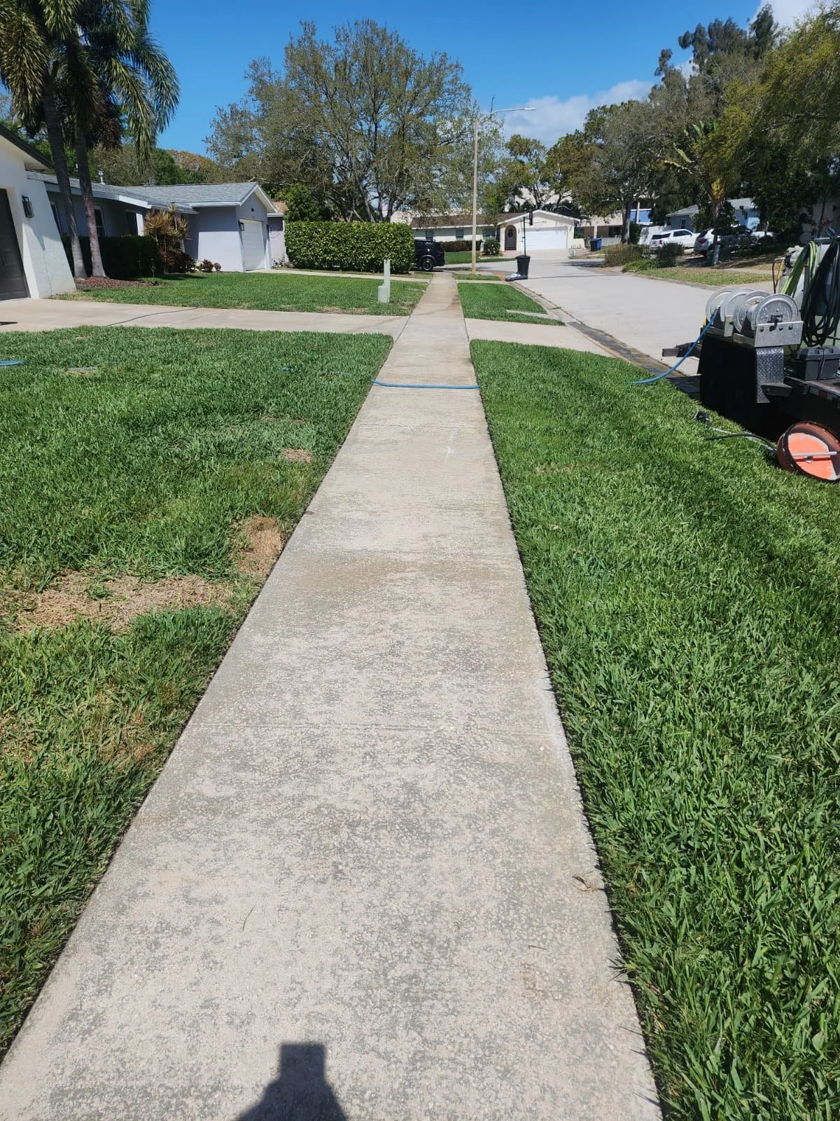 shore acres sidewalk marking paint removal after Jungle Nation