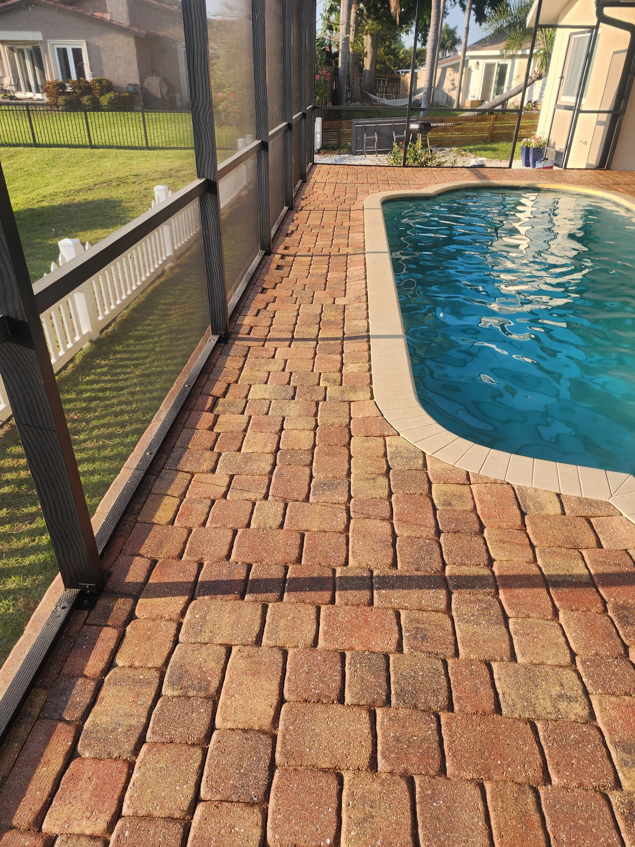 madeira beach pool deck paver sealing before Jungle Nation