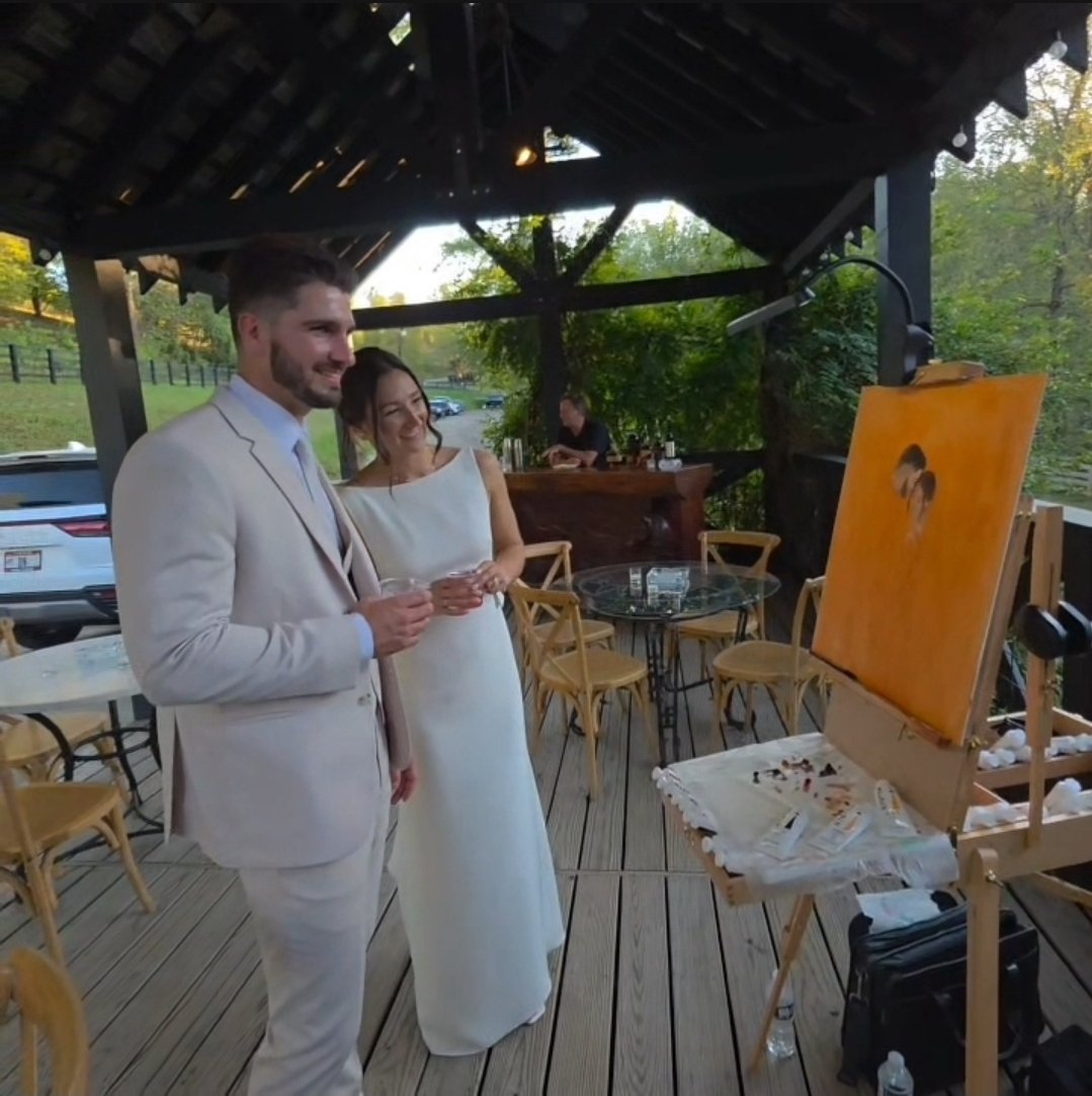 Ohio live wedding painting in progress for bride and groom to see during cocktail hour of wedding.