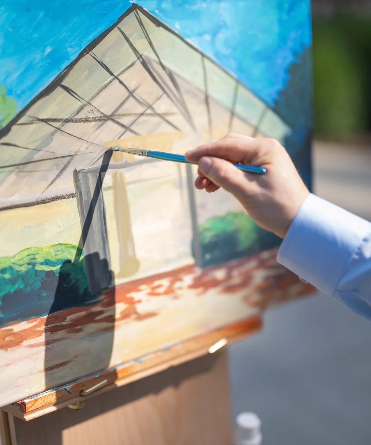 Ohio live wedding painter creating a painting at Jorgenson Farms Wedding Venue