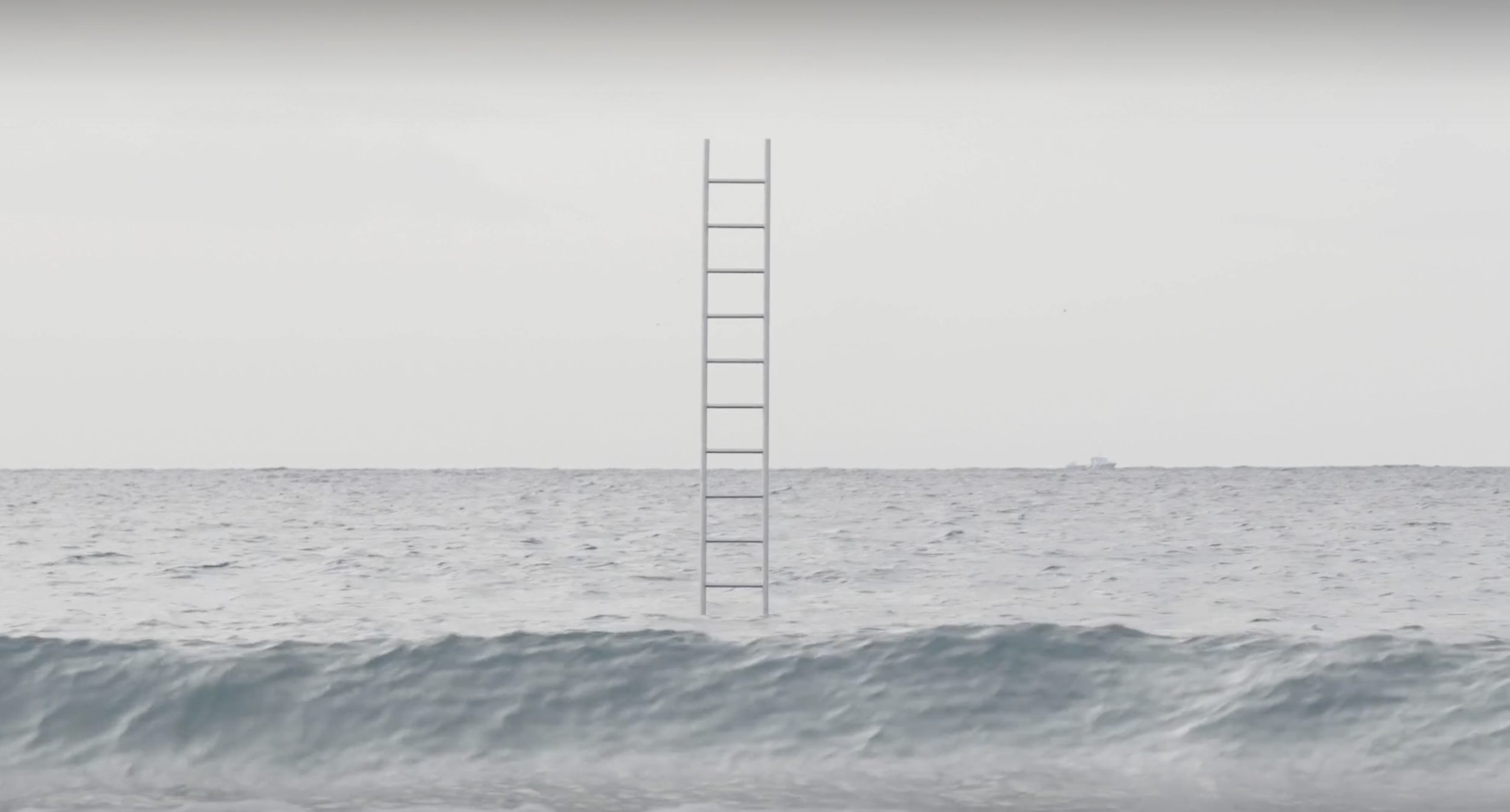 A ladder standing upright in the ocean with waves in the foreground and a ship in the distance under a cloudy sky.