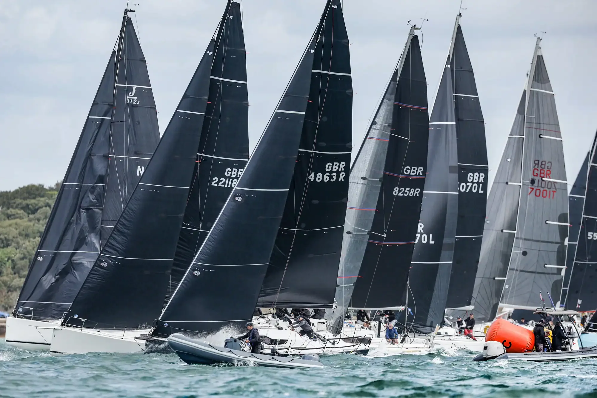 Fleet of racing yachts competing during Cowes Week