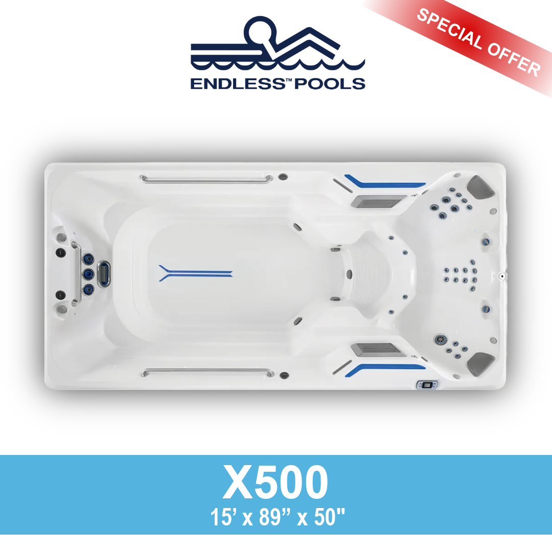 Top view of a white Endless Pools X500 hot tub with multiple jet nozzles, control panel, and blue accents, labeled as a special offer.