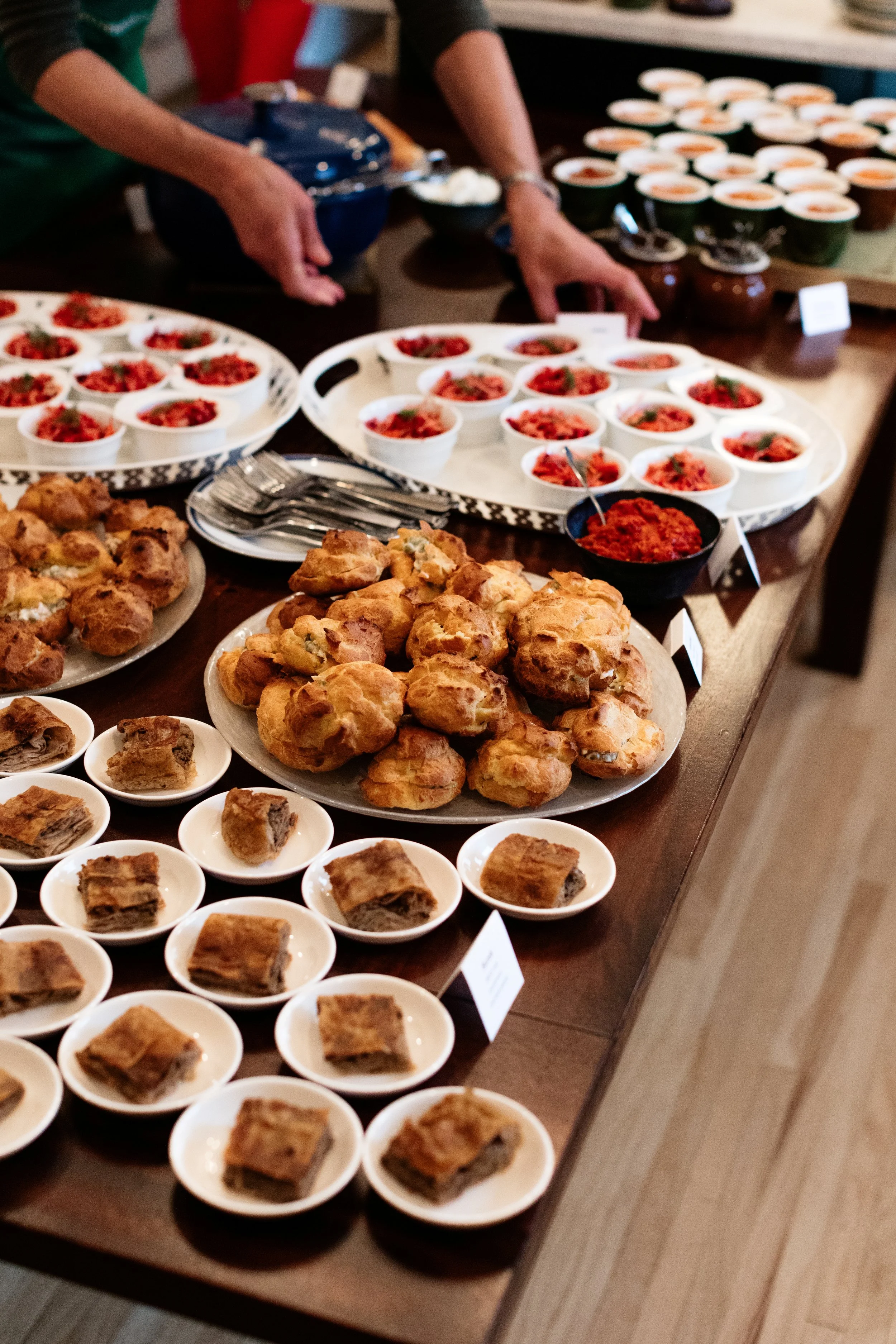 FoodSpreadwithServiceHandsLowerRez.jpg