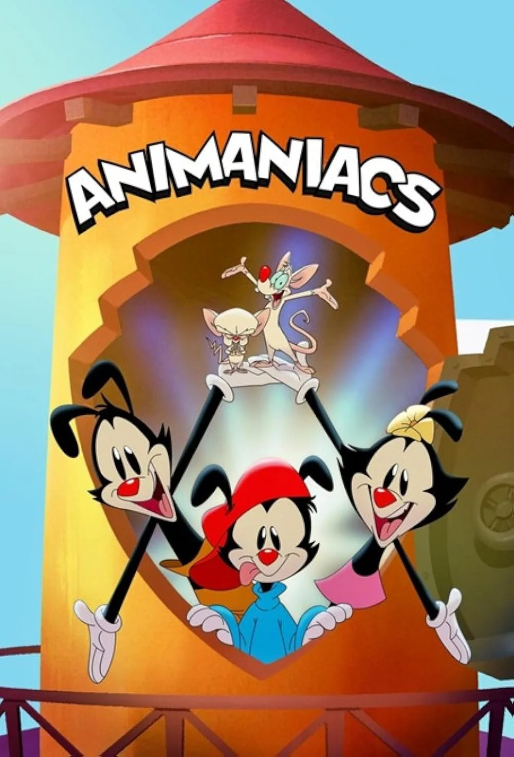 Animation theme park attraction called 'Animaniacs' with characters from the show, including Yakko, Wakko, and Dot, on the front of a tower with a sign at the top.