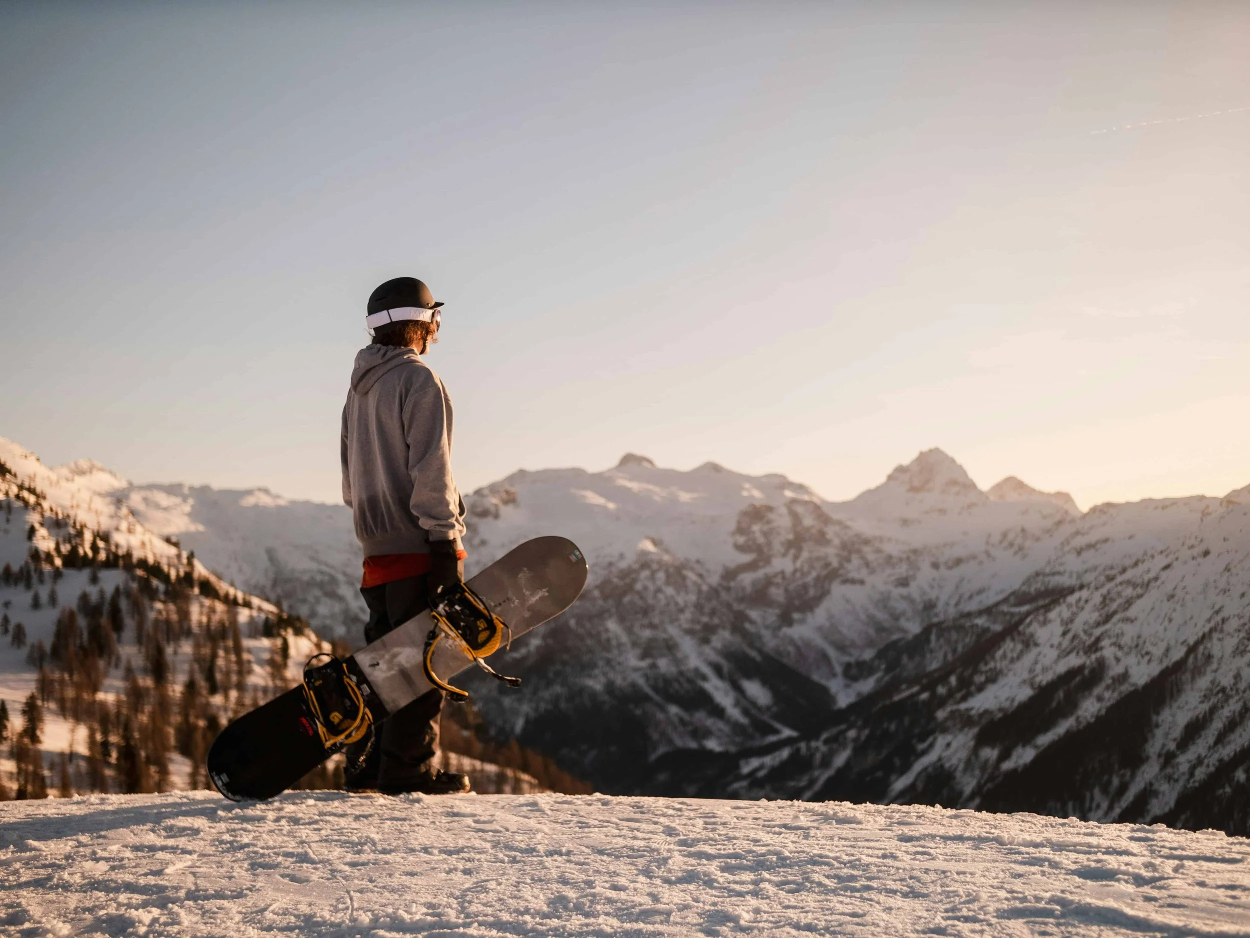 Resources snowboarder looking out over mountains