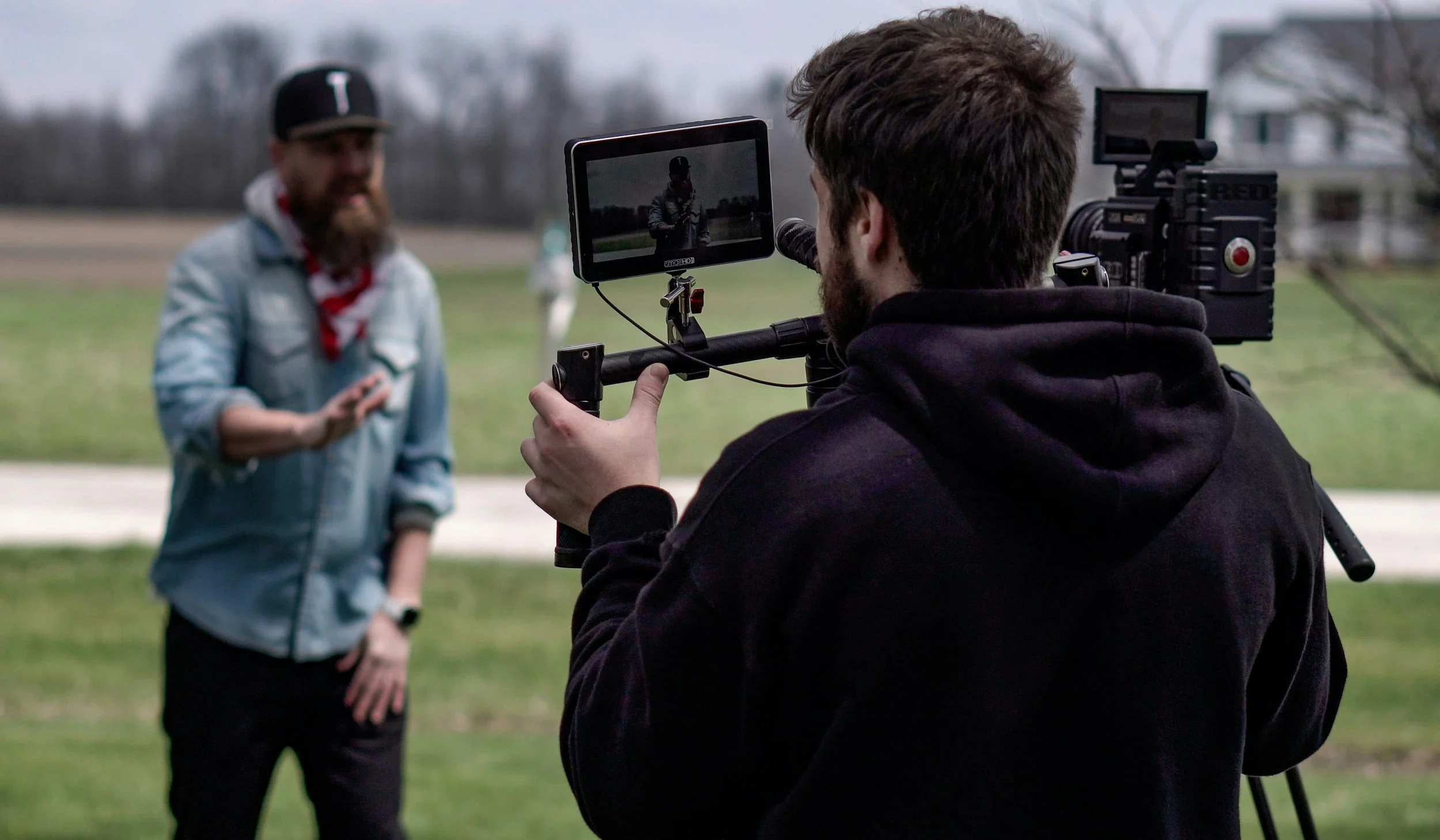 Videographer filming short-form social media video with a phone on a gimbal