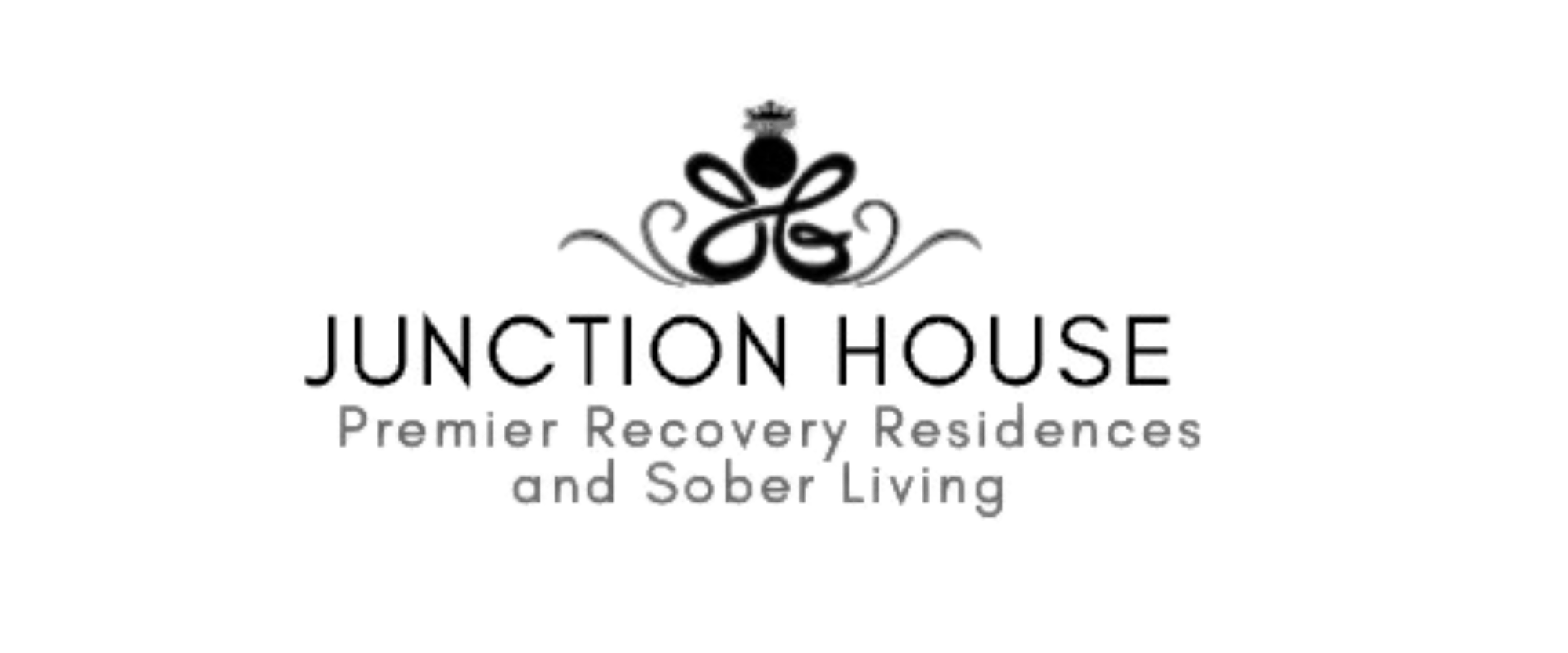 Logo for the Duck House, a paper flower recovery Bed & Breakfast and guest house, featuring a stylized flower design and the name in elegant font.