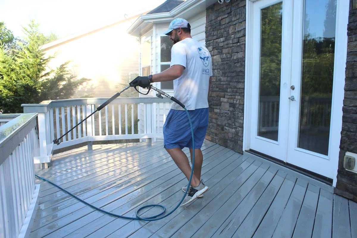 Pressure washing deck on back of home in Waxhaw, NC.
