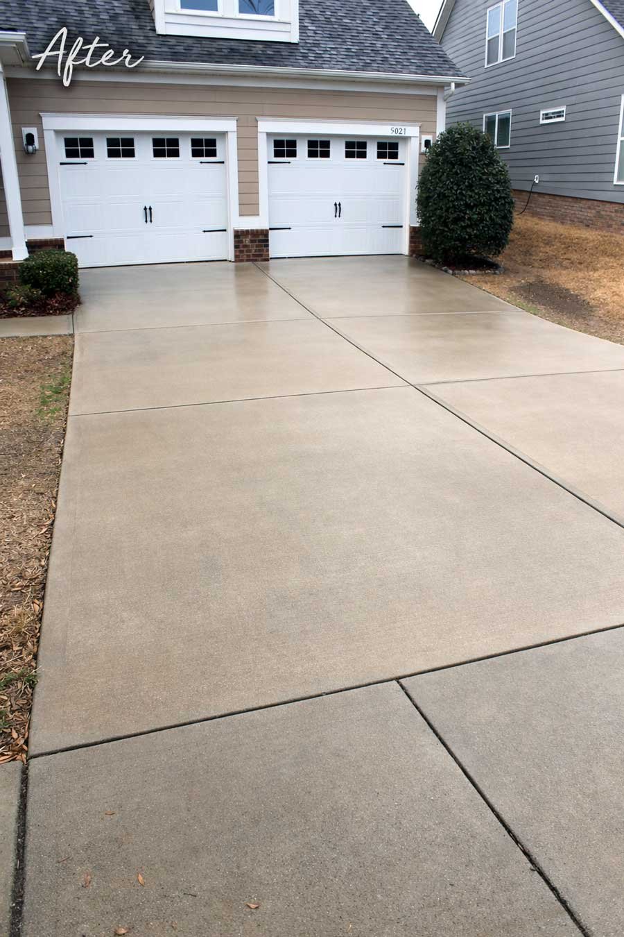 Driveway in Waxhaw, NC after pressure washing by professional.