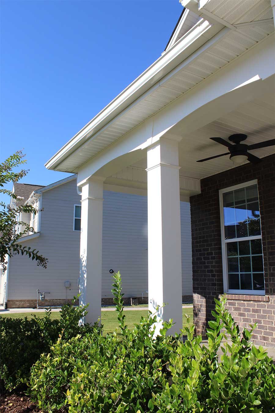 Clean front patio of residence in Waxhaw, NC after pressure washing.