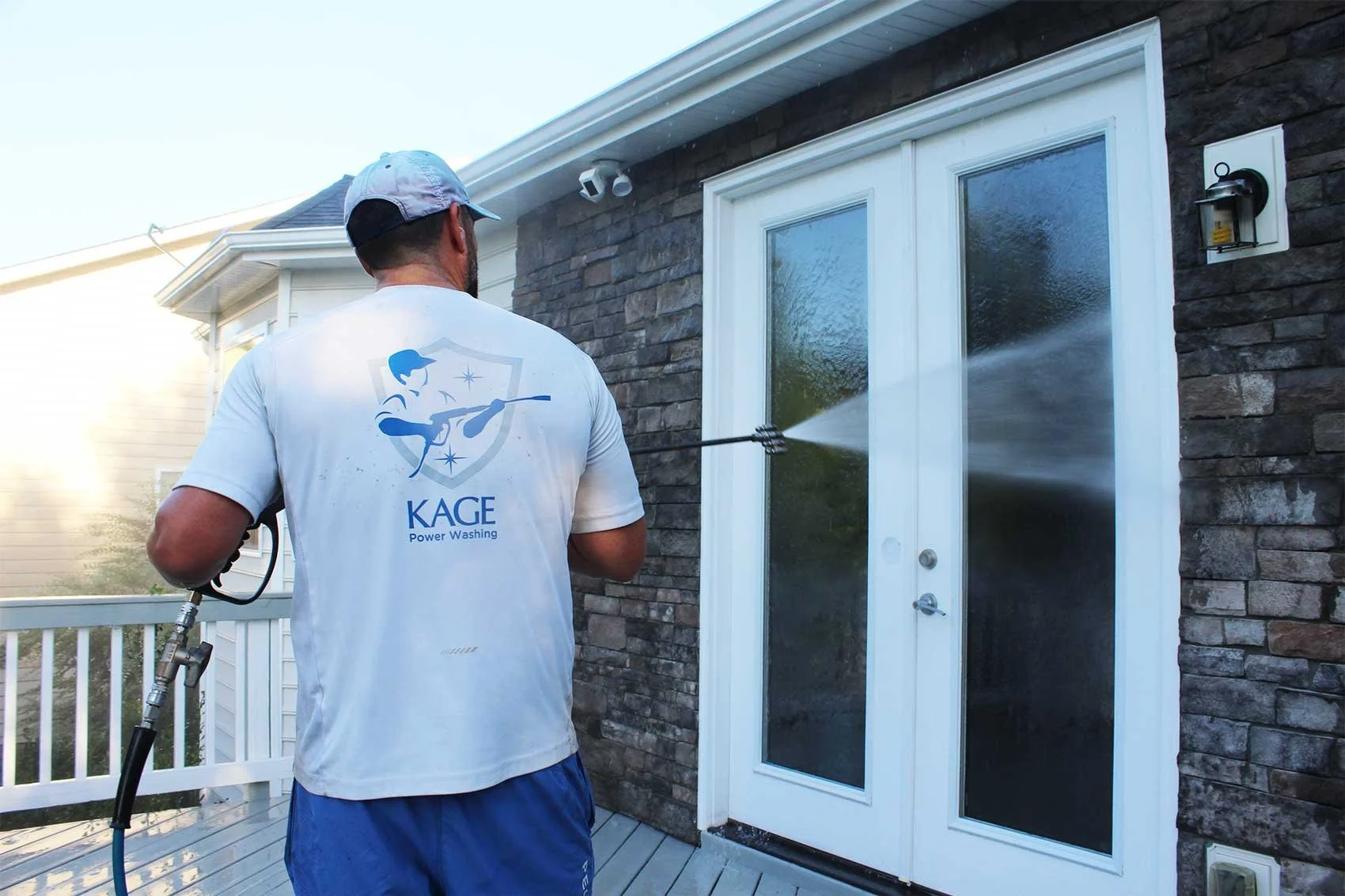 KAGE power washing back door of residence in Waxhaw, NC