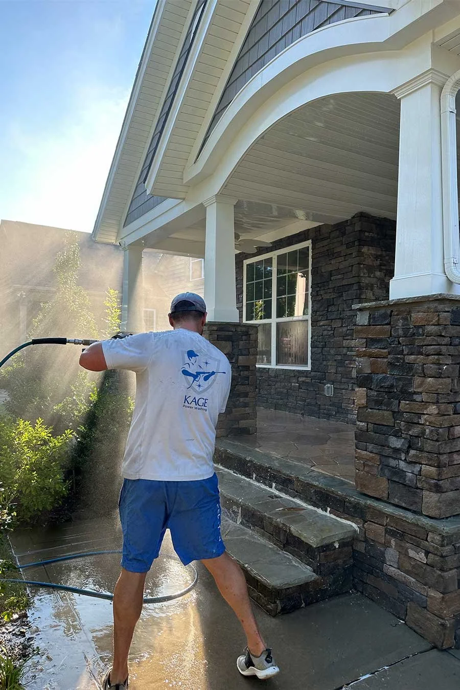 Pressure washing steps on front porch of house in Waxhaw, NC