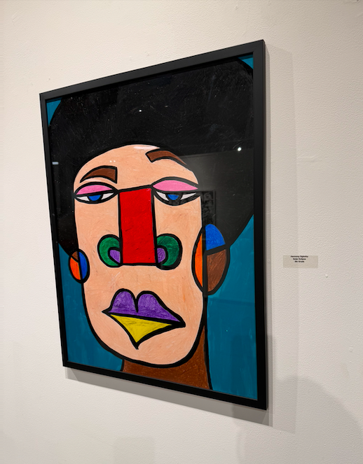 Laurie’s customers, Fernando and Kate embracing by the lake on their wedding day.