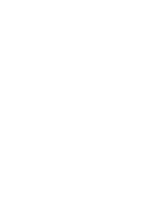 A person standing on a beach during sunset, holding a surfboard.