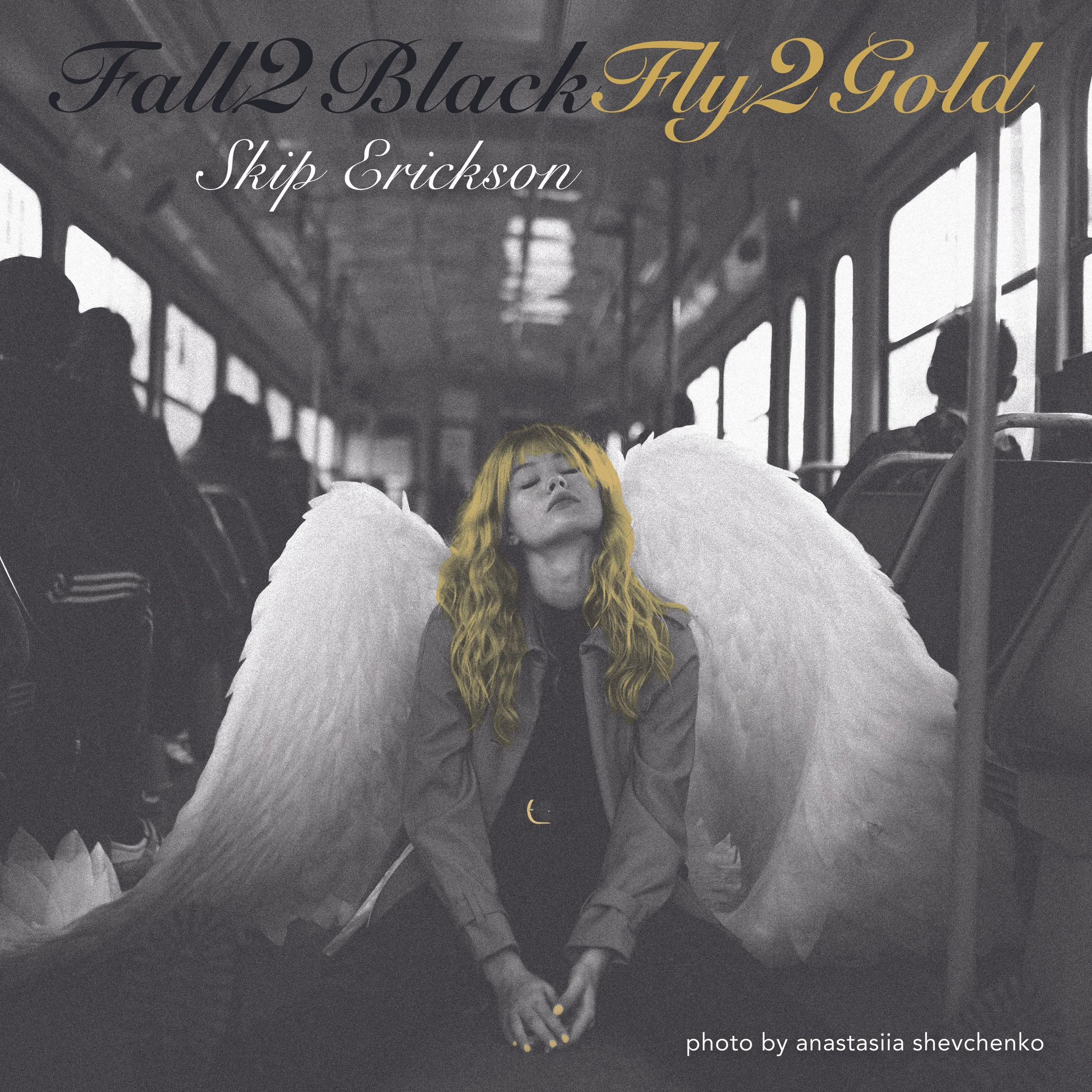 A woman with long, wavy blonde hair and angel wings, with a black and white background and colored wings and hair. Text includes "Fall2 Black, Fly2 Gold" and the author's name, Skip Erickson, and at the bottom, 'photo by Anastasiia Shevchenko'