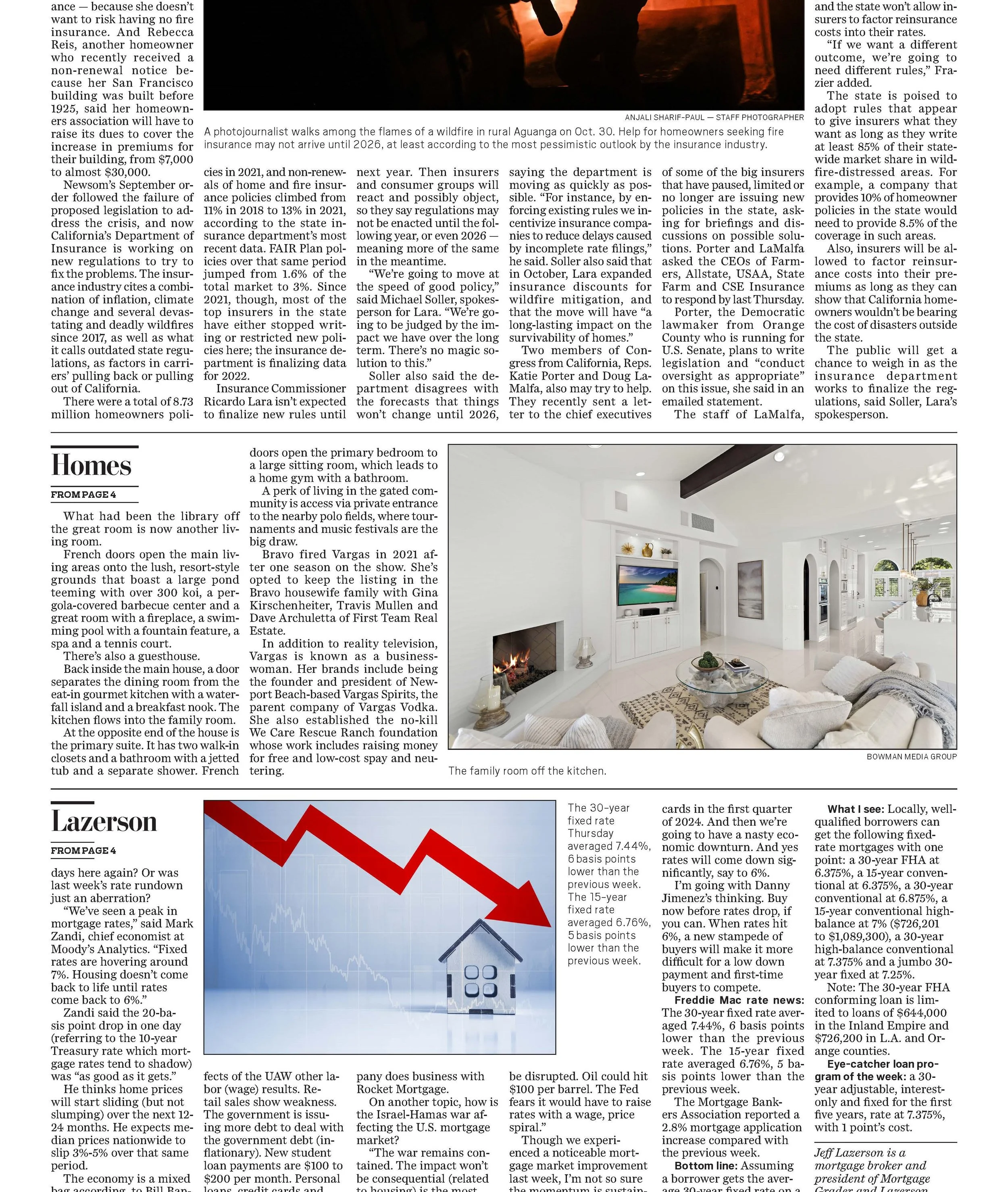 Living room with white walls, fireplace, and modern furniture including a beige sofa, a coffee table, and a television above the fireplace. Large windows with arched tops allow natural light to fill the room.