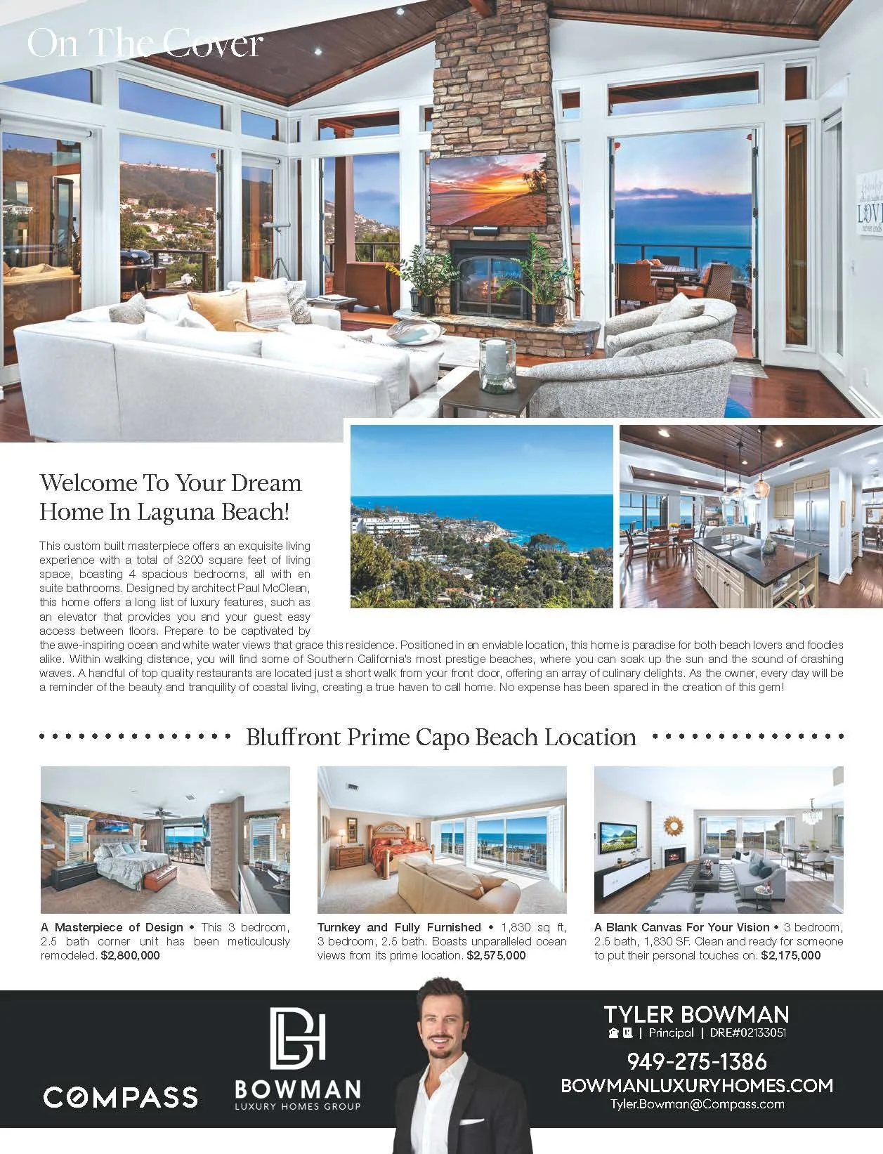 Interior of a luxurious living room with a stone fireplace, large windows showing ocean views, and modern furniture.