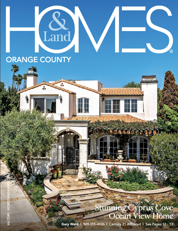 Cover of Homes & Land magazine featuring a Mediterranean-style oceanview home in Orange County, with lush greenery and clear blue sky.