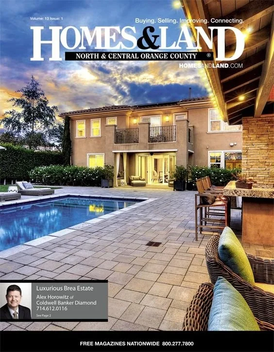 Backyard with swimming pool, patio furniture, and two-story house under a cloudy sky