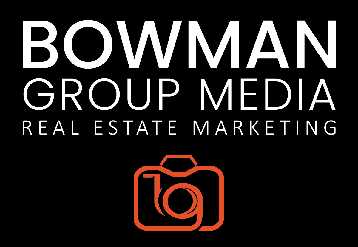 Logo for Bowman Group Media Real Estate Marketing featuring bold white text on a black background and an orange camera icon.