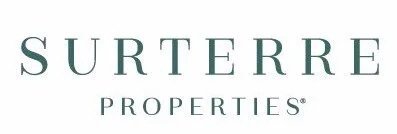 Surtère Properties logo in dark green text on a white background.