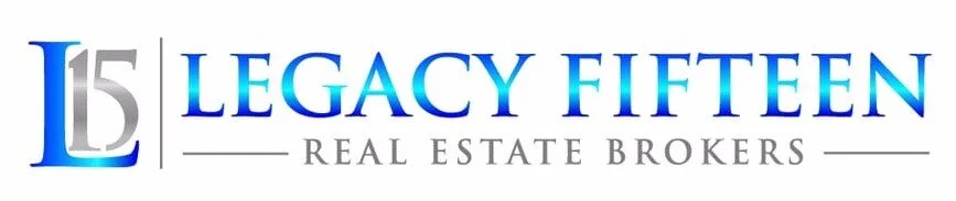 Logo for Legacy Fifteen Real Estate Brokers, featuring a stylized number 15 in gray and blue, with the company name in blue and gray text.